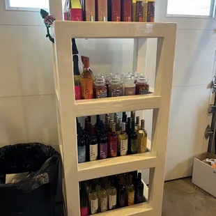 a wine rack with bottles