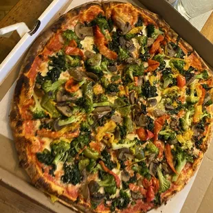 a pizza in a box on a table