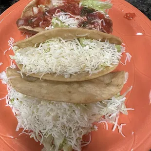 Crispy shredded beef tacos