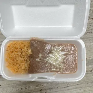 a meal in a styrofoam container