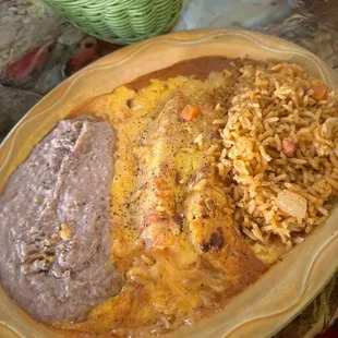 #1 with cheese enchilada and tamale, also comes with cheese puff and beef crispy taco on the side