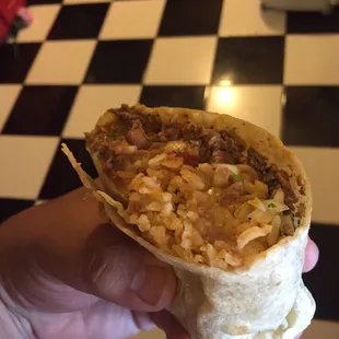 Half of a carne asada burrito (split with the wife).