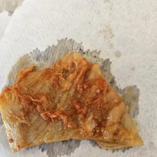 Hair on the top left corner.