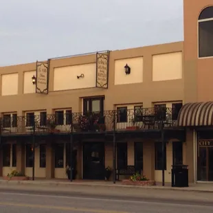 A view of la ville inn from across the street.
