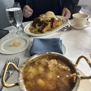French Onion Soup with French Toast in background