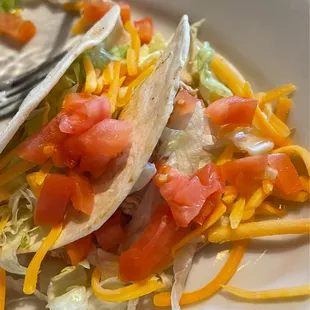 3-14-2023 shredded chicken tacos $6.50 Tuesday special 4 in the serving.
