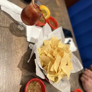 chips, guacamole, roasted salsa, and swirl margarita