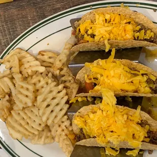 Beef tacos with fries. Cheese only.