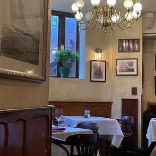 a dining room with tables and chairs