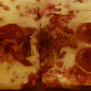 two slices of pepperoni pizza