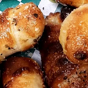 Pepperoni Rolls!  Pepperoni and Mozzarella rolled up in our homemade dough, baked, and covered with garlic butter and parmesan.