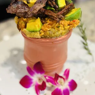 Ultimate Mofongo filled with arroz mamposteo, avocado and Churrasco