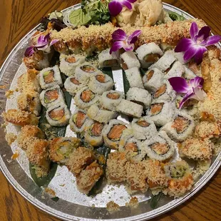 It tilt in the car lol but that's the party tray #2 Which was the Salmon Basic Roll and Fuego special roll