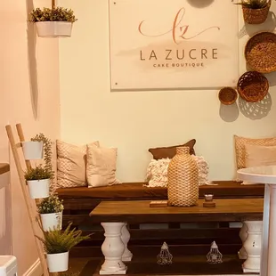 a wooden bench with pillows