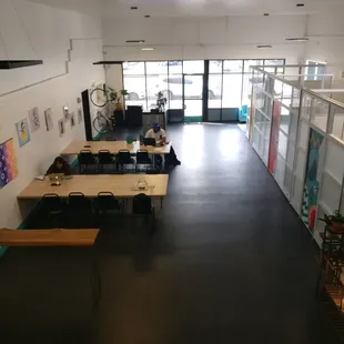 This is where our community comes to play. Our open area has both standing and sitting options for coworking and collaborating.