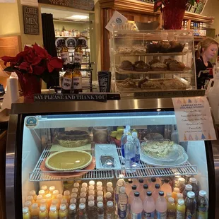 a display case with a variety of food items
