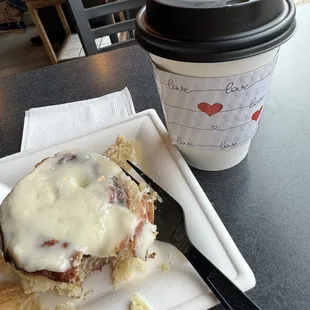 Cinnamon roll and cappuccino