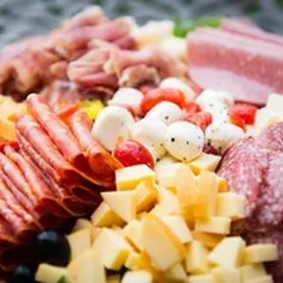 a platter of meat and cheese