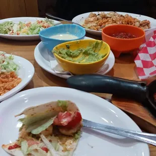 Steak and Shrimp Fajitas. The husband had a dish with lots of Spanish rice, Queso, shrimp, scallops, &amp; faux crab. You do NOT leave hungry!