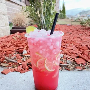 a drink with a straw in it