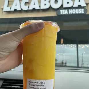 Mango smoothie with peach pop boba 50% sweetness level