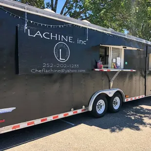 a food truck parked in a parking lot
