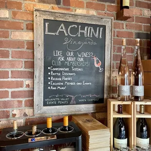 a chalkboard with a list of wines