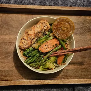 this is a HALF order!  Signature Garlic Noodles  Vegetable Medley Grilled Salmon and Diane&apos;s special sauce (a must)