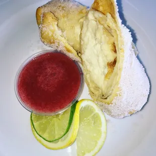 Xango (Fried Cheesecake) served with a Homemade Strawberry Sauce on the side!!