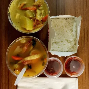 Yellow curry, Shrimp Tom Yum Soup, and a side of white rice.