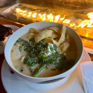 a bowl of soup on a plate