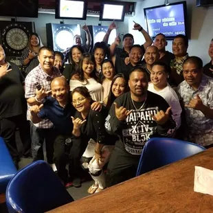 a group of people posing for a picture