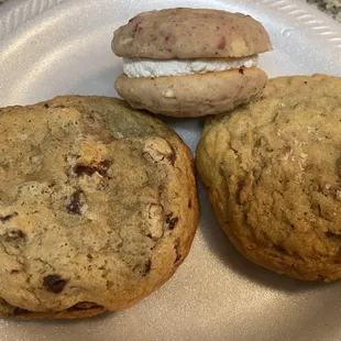 three cookies on a paper plate