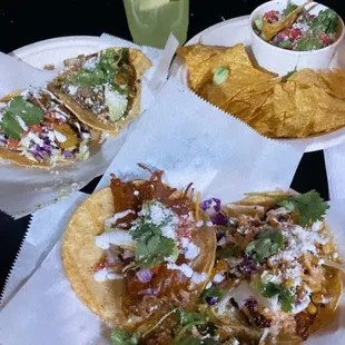 Asada taco, steak and salmon.