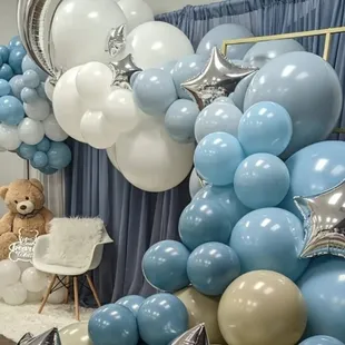 Baby shower
This is our luxury balloon garland with drapes, teddy bear air balloon, chair and rug.
