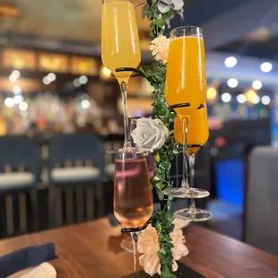 two glasses of champagne on a table