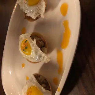 Wonton cups (w/ quail egg and chorizo)