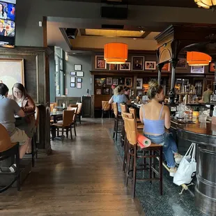 people sitting at the bar