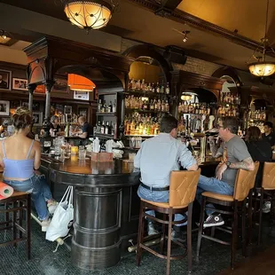 people sitting at a bar