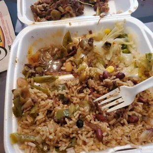 two take out containers of food