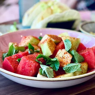 Melon, mint, Tajin, and balsamic vinegar deliciousness!! (Melon salad, no tomatoes). Photo by Oanh McClure.