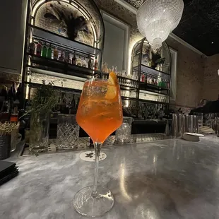 two cocktails on a bar