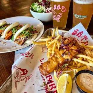Pork belly bao buns, fish and chips, watermelon salad, and beers!
