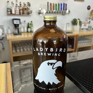 a bottle of beer on a bar