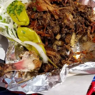 Pulled pork on blacked fries. Took the pick halfway in because how do you expect me not to start eating immediately?