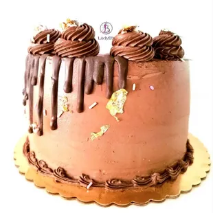 a chocolate cake with chocolate icing