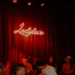 people sitting at a bar