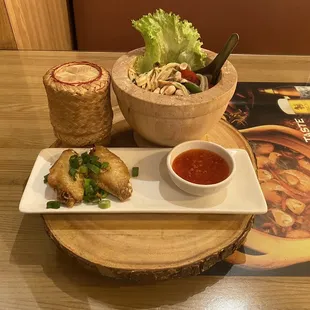 Ezarn combo. 2 1/2 chicken wings, sticky rice, &amp; papaya salad.