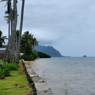 Chinaman's Hat is in the distance on the right