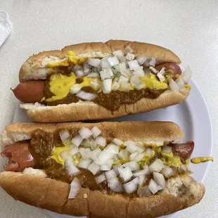 two hot dogs on a plate